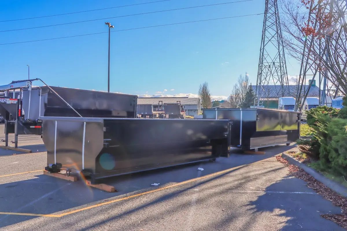 Roll-off dumpster ready for waste disposal at job site for Construction Dumpster Rental in Garden Acres